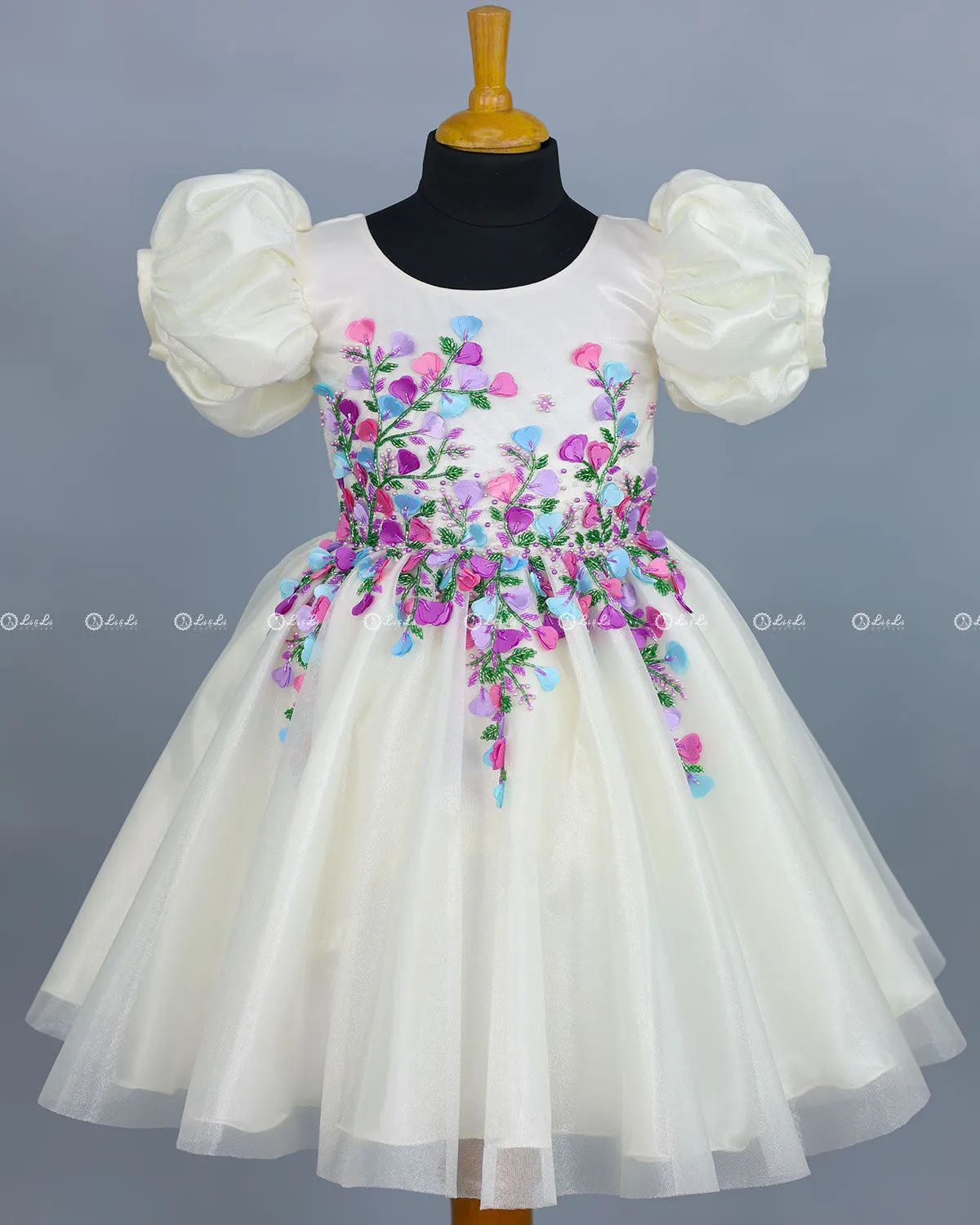 Elegant White Gown Highlighted with Handcrafted Multicolour Flowers