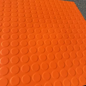 Tarkett | Johnsonite Solid Color Rubber Raised Round 24x24 Tile - Orange